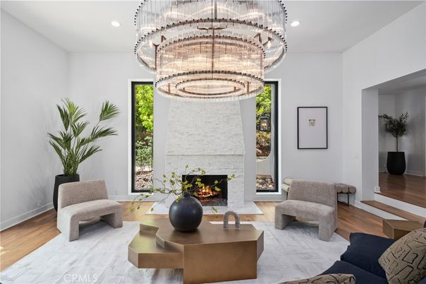 Fireplace, Interior, Living room, Marble, Pendant Lights, Recessed Lighting, Stone Walls, Wood Texture Flooring