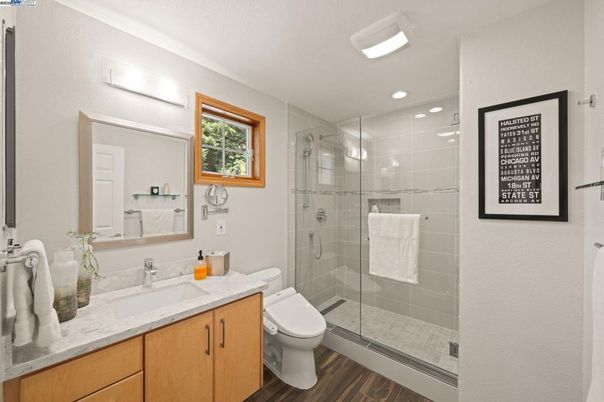 Bathroom, Glass Shower, Interior, Recessed Lighting, Wood Texture Flooring