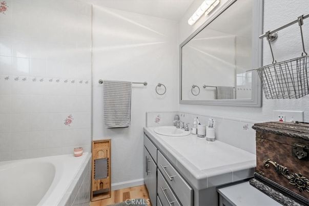 Bathroom, Dual Sink Vanities, Interior, Tile Countertops, Wood Texture Flooring