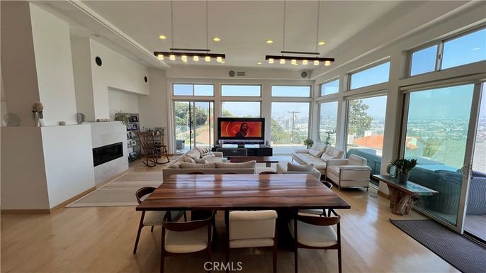 Dining room, Fireplace, Interior, Living room, Pendant Lights, Wood Texture Flooring
