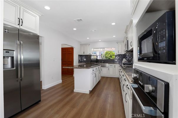 Interior, Kitchen, Recessed Lighting, Stainless Steel Appliances, Wood Texture Flooring