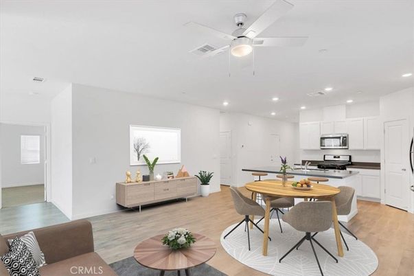 Dining room, Interior, Kitchen, Recessed Lighting, Stainless Steel Appliances, Wood Texture Flooring