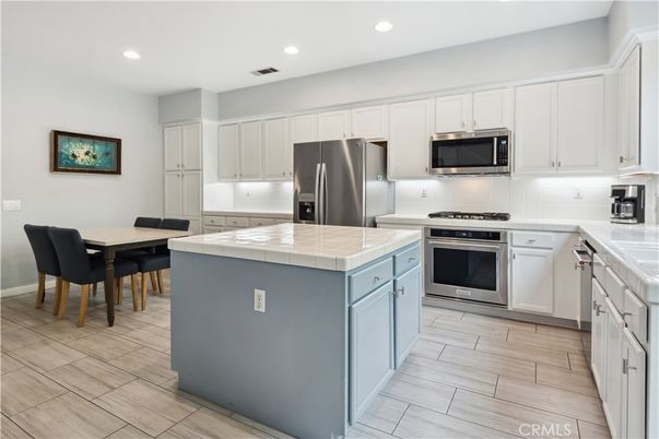Dining room, Interior, Kitchen, Recessed Lighting, Stainless Steel Appliances, Tile Countertops