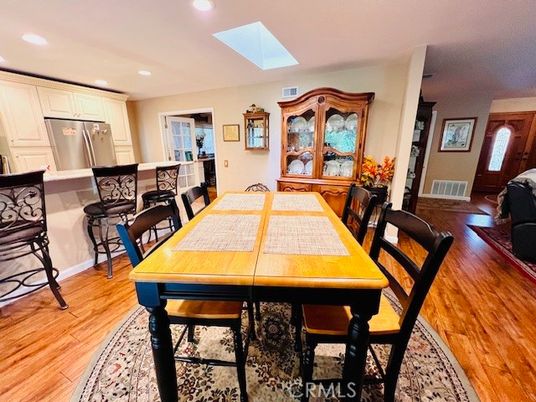 Dining room, Interior, Kitchen, Recessed Lighting, Stainless Steel Appliances, Wood Texture Flooring