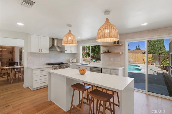 Dining room, Interior, Kitchen, Recessed Lighting, Stainless Steel Appliances, Wood Texture Flooring