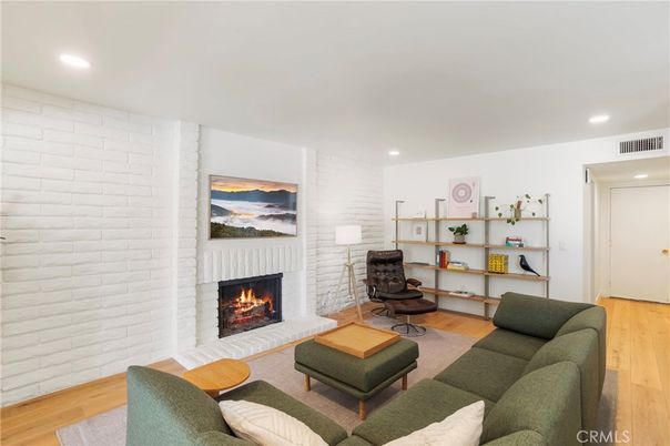 Fireplace, Home Office, Interior, Living room, Recessed Lighting, Stone Walls, Wood Texture Flooring