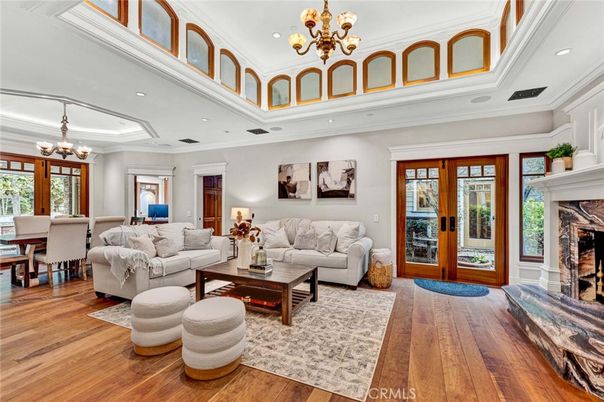 Chandelier, Dining room, Fireplace, Interior, Living room, Recessed Lighting, Wood Texture Flooring