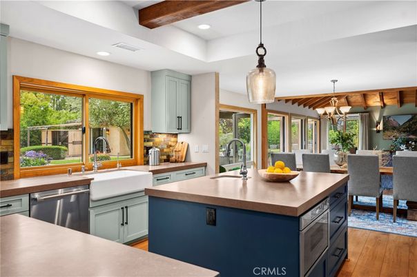 Chandelier, Dining room, Interior, Kitchen, Pendant Lights, Recessed Lighting, Stainless Steel Appliances, Wooden Beams, Wood Texture Flooring