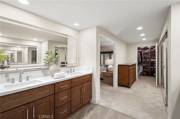 Bathroom, Dual Sink Vanities, Interior, Recessed Lighting, Walk-in Closets, Wood Texture Flooring