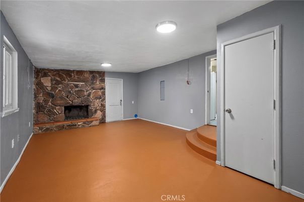 Empty room, Fireplace, Interior, Recessed Lighting, Stone Walls