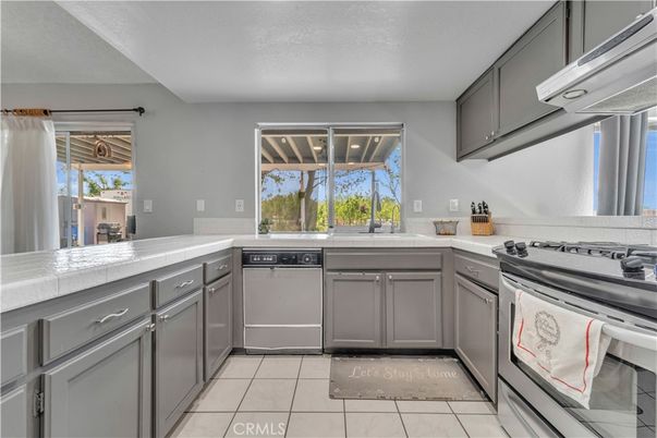 Interior, Kitchen, Stainless Steel Appliances, Tile Countertops