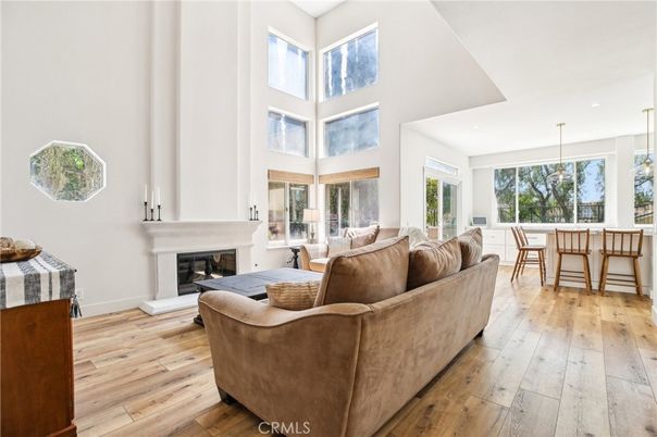 Dining room, Fireplace, Interior, Living room, Pendant Lights, Recessed Lighting, Wood Texture Flooring