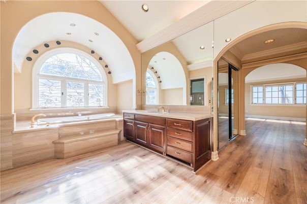 Bathroom, Dual Sink Vanities, Interior, Recessed Lighting, Wood Texture Flooring