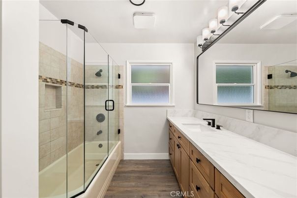 Bathroom, Dual Sink Vanities, Glass Shower, Interior, Wood Texture Flooring