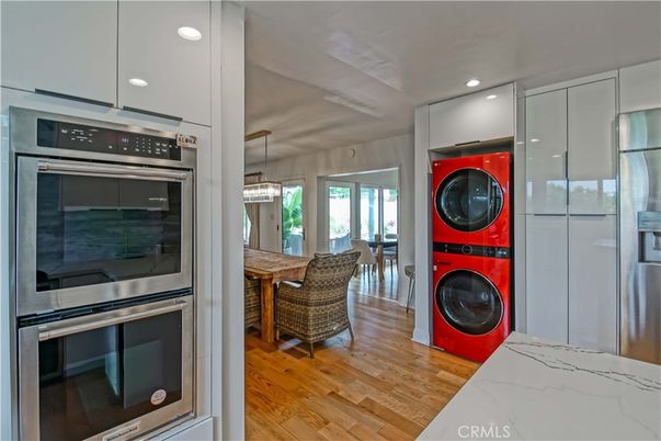 Interior, Kitchen, Pendant Lights, Recessed Lighting, Stainless Steel Appliances, Washer, Wood Texture Flooring