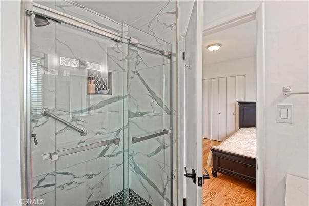 Bathroom, Bedroom, Glass Shower, Interior, Marble Walls, Wood Texture Flooring