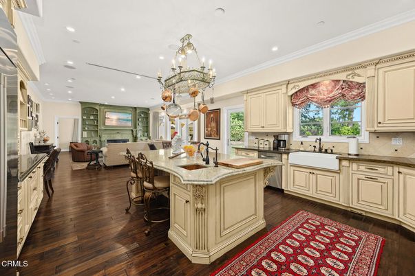Chandelier, Interior, Kitchen, Living room, Recessed Lighting, Stainless Steel Appliances, Wood Texture Flooring