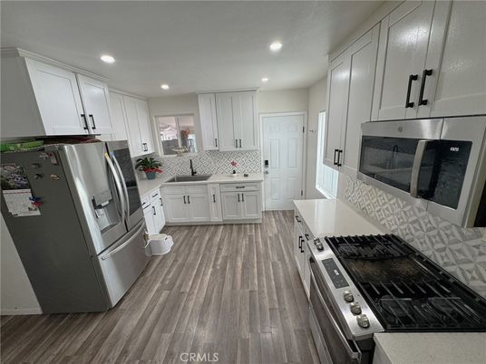 Interior, Kitchen, Recessed Lighting, Stainless Steel Appliances, Wood Texture Flooring