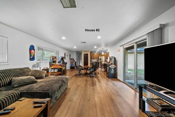 Dining room, Interior, Kitchen, Living room, Recessed Lighting, Stainless Steel Appliances, Wood Texture Flooring