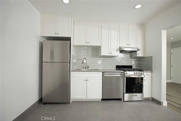 Interior, Kitchen, Recessed Lighting, Stainless Steel Appliances, Wood Texture Flooring