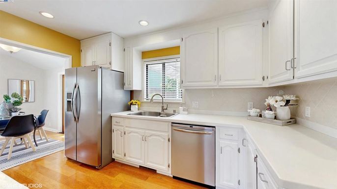 Dining room, Interior, Kitchen, Recessed Lighting, Stainless Steel Appliances, Wood Texture Flooring