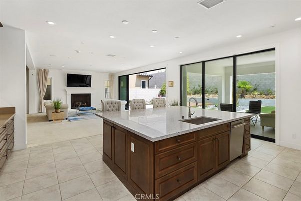 Fireplace, Interior, Kitchen, Living room, Recessed Lighting, Stainless Steel Appliances