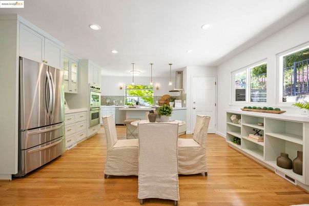 Dining room, Interior, Kitchen, Pendant Lights, Recessed Lighting, Stainless Steel Appliances, Wood Texture Flooring