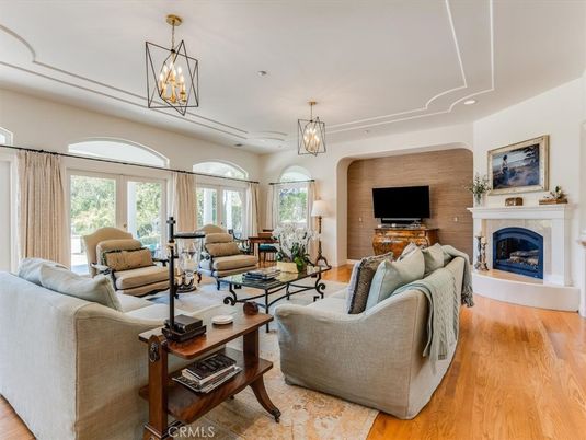 Chandelier, Fireplace, Interior, Living room, Recessed Lighting, Wood Texture Flooring