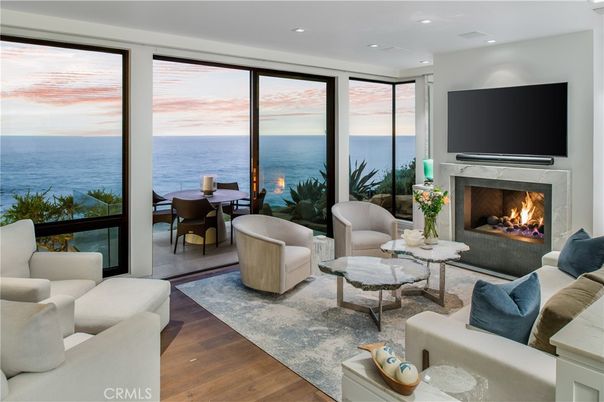 Dining room, Fireplace, Interior, Living room, Recessed Lighting, Water, Wood Texture Flooring