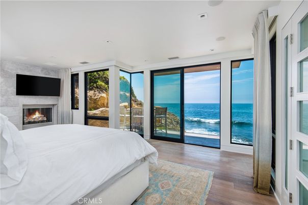 Bedroom, Fireplace, Interior, Recessed Lighting, Water, Wood Texture Flooring