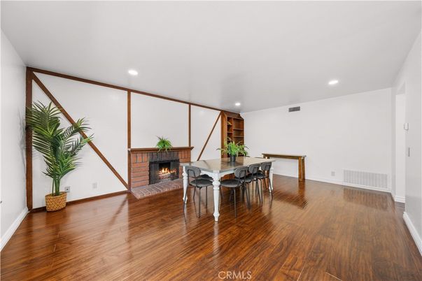 Dining room, Fireplace, Interior, Recessed Lighting, Wood Texture Flooring