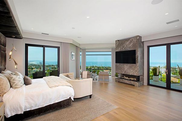 Bedroom, Fireplace, Interior, Recessed Lighting, Water, Wood Texture Flooring