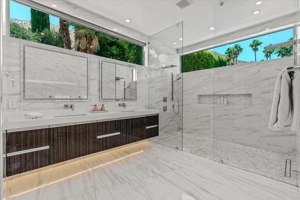 Bathroom, Dual Sink Vanities, Glass Shower, Interior, Marble, Marble Walls, Recessed Lighting
