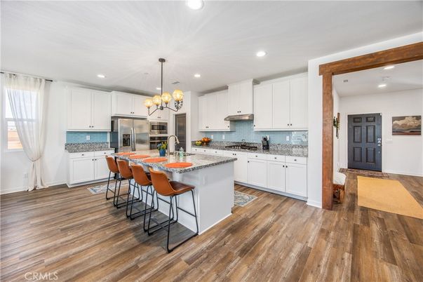 Chandelier, Interior, Kitchen, Recessed Lighting, Stainless Steel Appliances, Wood Texture Flooring