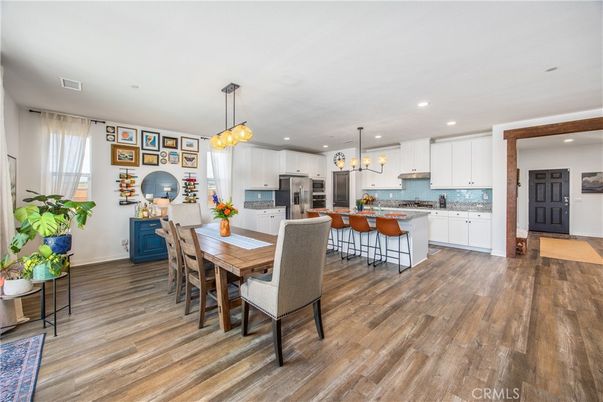 Dining room, Interior, Kitchen, Pendant Lights, Recessed Lighting, Stainless Steel Appliances, Wood Texture Flooring