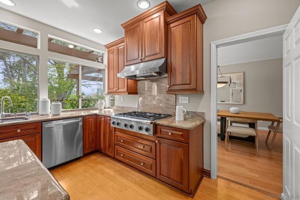 Dining room, Interior, Kitchen, Recessed Lighting, Stainless Steel Appliances, Wood Texture Flooring