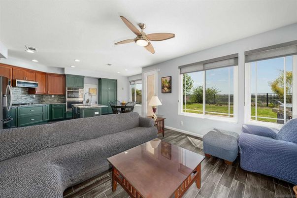 Dining room, Interior, Kitchen, Living room, Recessed Lighting, Stainless Steel Appliances, Wood Texture Flooring