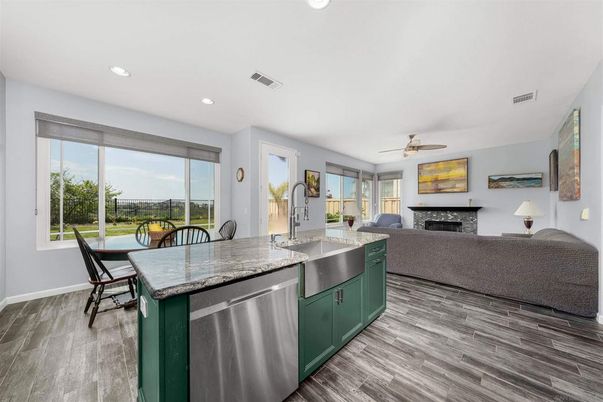 Dining room, Fireplace, Interior, Kitchen, Living room, Recessed Lighting, Wood Texture Flooring