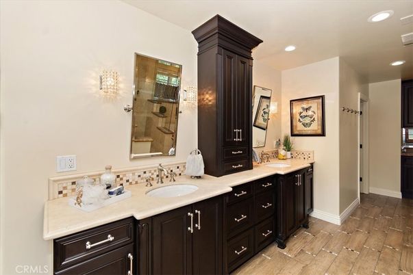Bathroom, Dual Sink Vanities, Interior, Recessed Lighting, Wood Texture Flooring