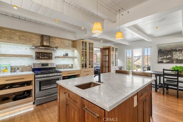 Interior, Kitchen, Pendant Lights, Stainless Steel Appliances, Stone Walls, Wood Texture Flooring