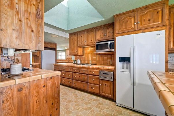 Interior, Kitchen, Recessed Lighting, Tile Countertops