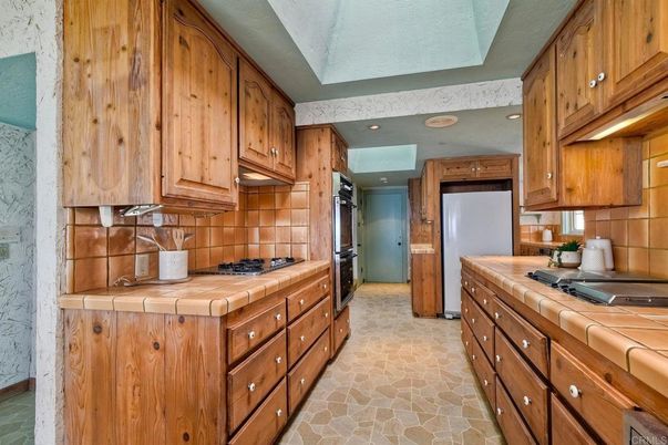 Interior, Kitchen, Recessed Lighting, Tile Countertops