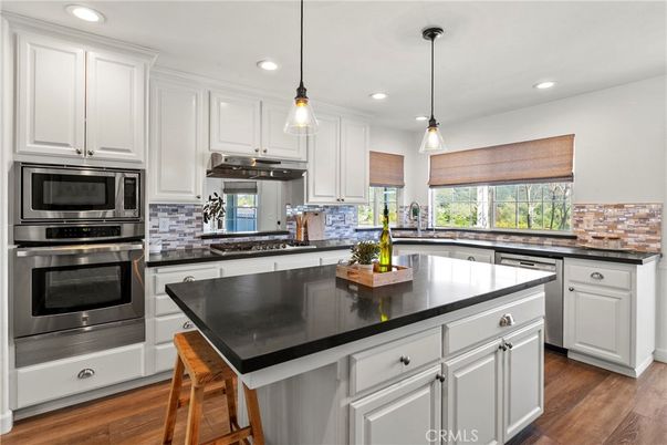 Interior, Kitchen, Pendant Lights, Recessed Lighting, Stainless Steel Appliances, Wood Texture Flooring