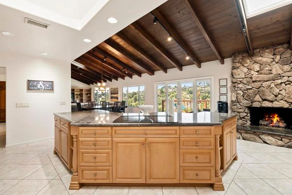Chandelier, Dining room, Fireplace, Interior, Kitchen, Pendant Lights, Recessed Lighting, Stone Walls, Wooden Beams, Wooden Ceilings