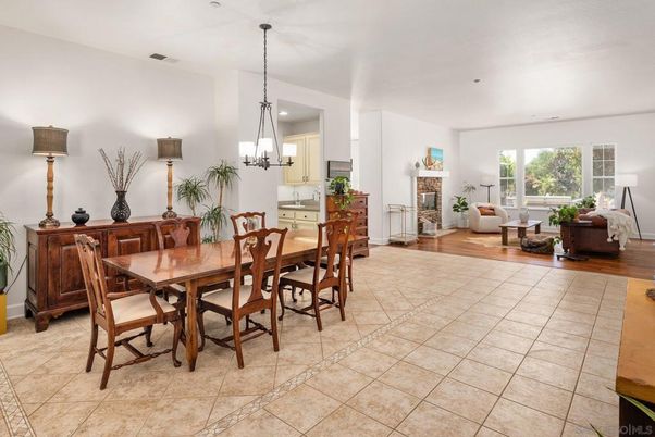 Chandelier, Dining room, Fireplace, Interior, Living room, Pendant Lights, Wood Texture Flooring