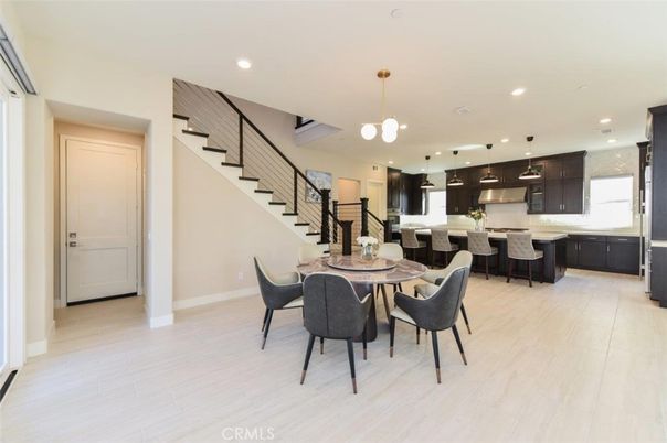 Dining room, Interior, Kitchen, Pendant Lights, Recessed Lighting, Stainless Steel Appliances, Wood Texture Flooring