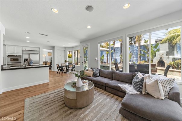 Dining room, Interior, Kitchen, Living room, Recessed Lighting, Stainless Steel Appliances, Wood Texture Flooring