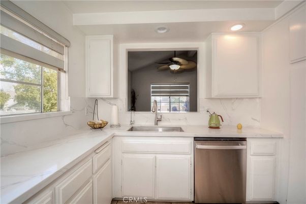 Interior, Kitchen, Marble Walls, Recessed Lighting, Stainless Steel Appliances