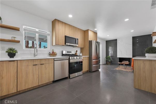 Fireplace, Interior, Kitchen, Recessed Lighting, Stainless Steel Appliances