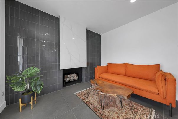 Fireplace, Interior, Living room, Marble Walls, Recessed Lighting